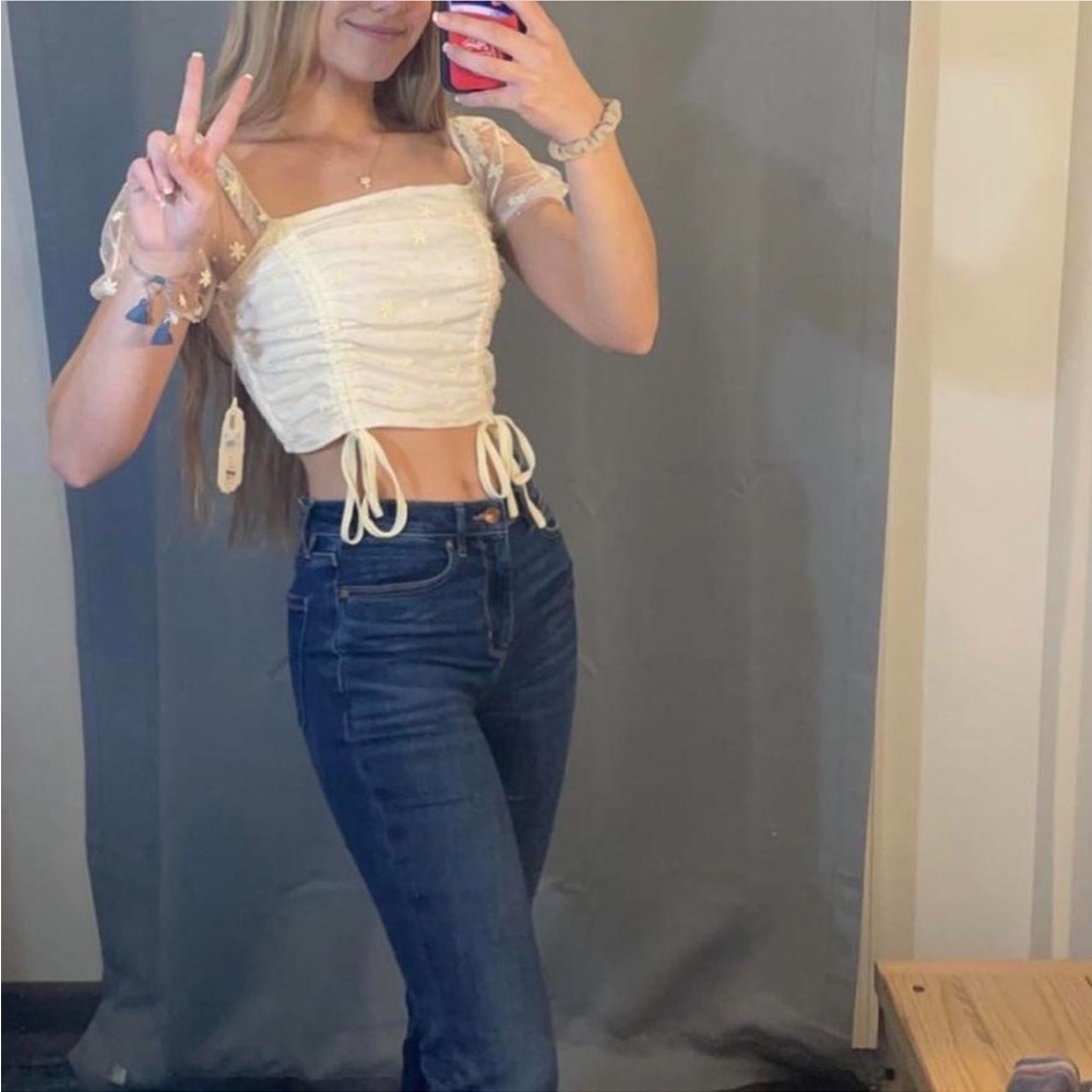 Crop top with ruching, flower embroidery, and puff sleeves